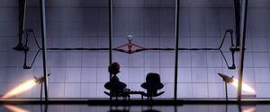 Edna shows Helen her suit