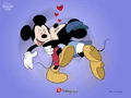 Minnie kissing mickey