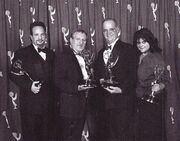  - 180px-Art_Codron,_Dan_Curry,_Ron_Moore_and_Liz_Castro_winning_their_Emmys_in_2002
