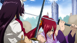 Erza Bloquea Archienemigo
