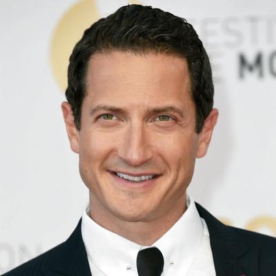 Sasha Roiz and partner